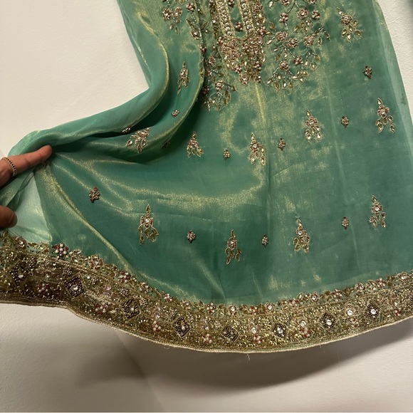 Two piece formal salwar kameez in a soft sea-green shade with intricate gold - Picture 7 of 9